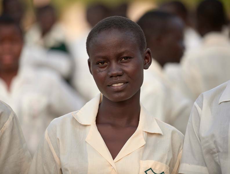 A girl lines up for morning assembly at the Loreto Girls Secondary School in Rumbek, South Sudan. The school, run by the Institute for the Blessed Virgin Mary--the Loreto Sisters--of Ireland, educates young women from throughout the war-torn country.